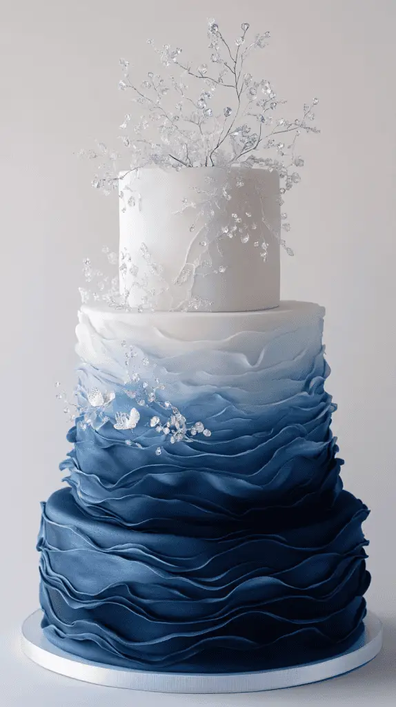 Modern sculptural ocean twilight opalite wedding cake with sharp, clean tiers featuring a dramatic indigo-to-pearl