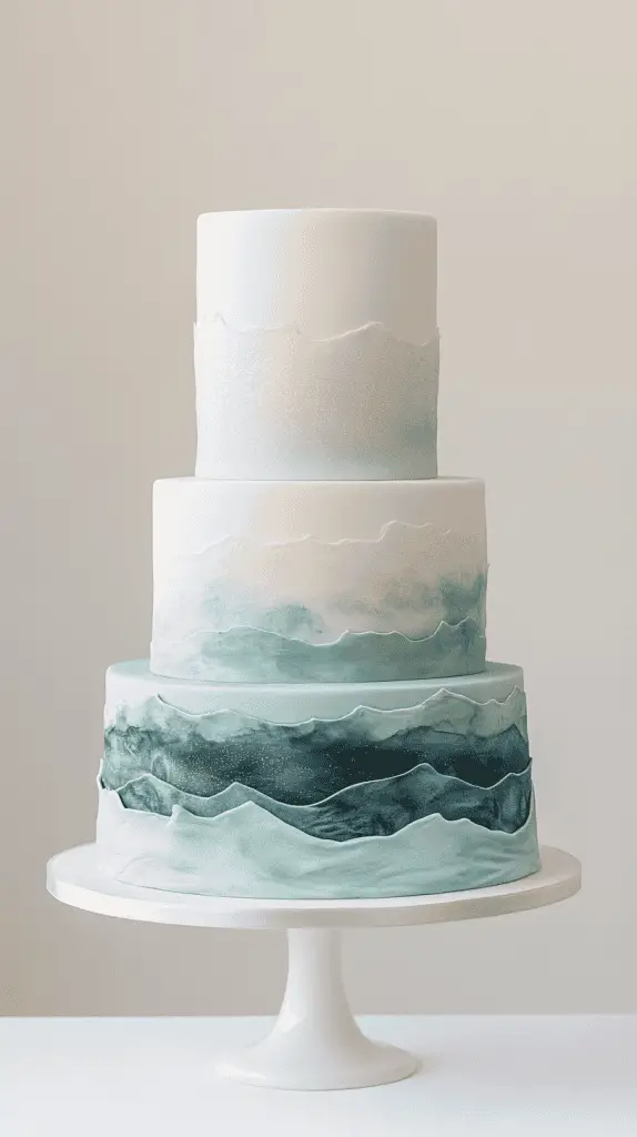 three-tier modern opalite shoreline ombre wedding cake with airbrushed gradients moving from sand-cream